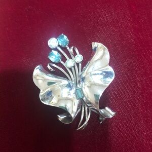 Elegant Silver Butterfly Brooch with Blue Accents